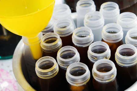 Fruit juice in plastic bottles at a street food market