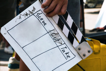 close up image of film production crew holding Film Slate on setの写真素材