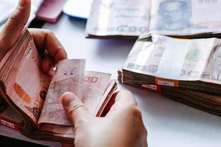 close up image of female hand count the money, business accounting backgroundの写真素材