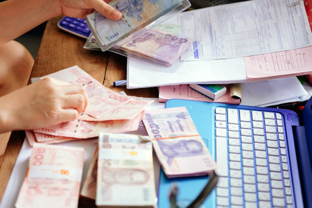 close up image of female hand count the money, business accounting backgroundの写真素材