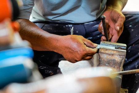 Image of Metalworker working in workshopの写真素材