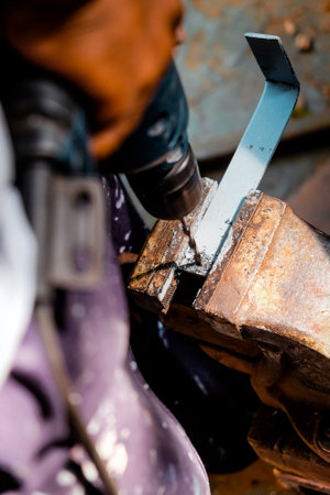 Image of Metalworker working on a drilling machineの写真素材