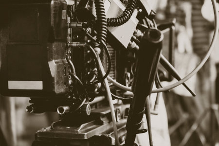 Close-up of a professional video camera. Filtered image processed vintage effect.の写真素材