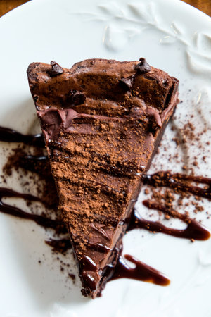 Chocolate Crepe Cake with Chocolate Sauce on top. Selective focus.の写真素材