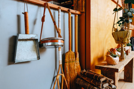 Image of Household utensils hanging on the wall in the kitchen.の写真素材