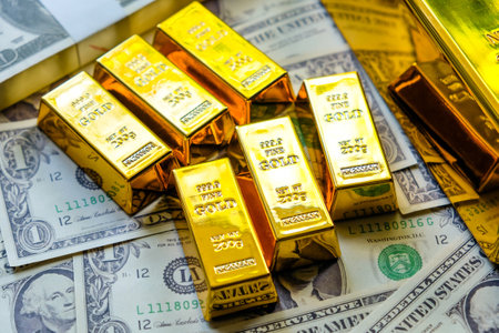 Gold bars and dollar banknotes. Business and finance investment concept.の写真素材