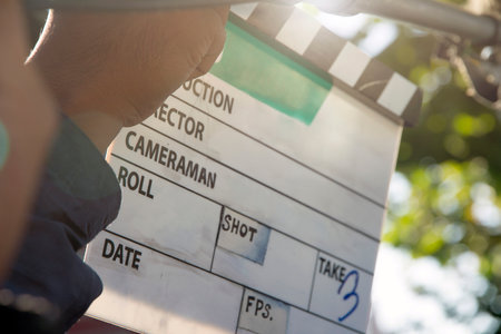 Film Slate, close up image of film production crew holding Film Slate on set