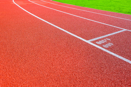Running track in the stadium, sport background and texture. Running track for athletics