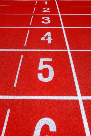 Running track with numbers in the stadium, sport background.