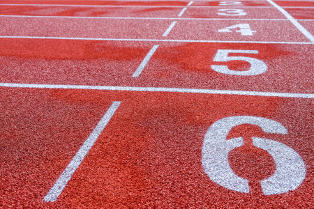 Running track with numbers in the stadium, sport background.