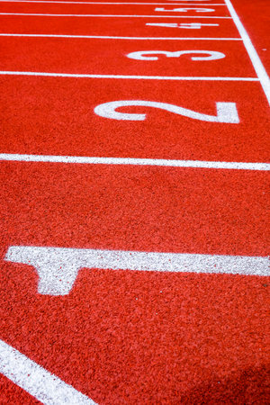 Running track with numbers in the stadium, sport background.