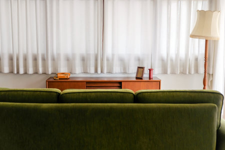 Interior of a living room with green sofa and coffee table.の写真素材