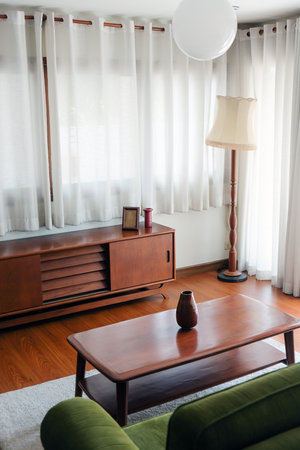 Interior of a living room with green sofa and coffee table.の写真素材