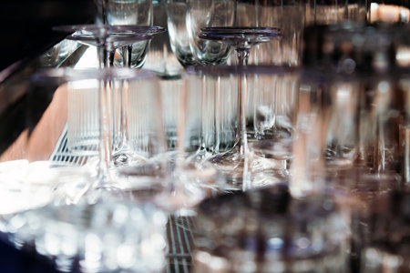 Closeup image of Glassware on bar counter in restaurant.
