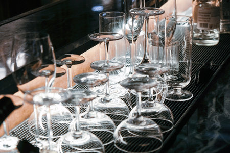 Closeup image of Glassware on bar counter in restaurant.