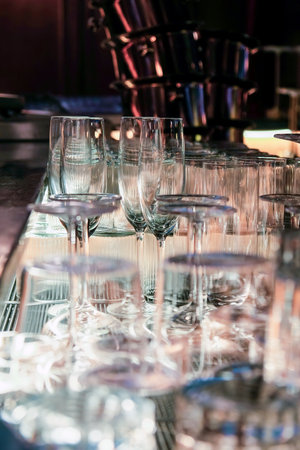 Closeup image of Glassware on bar counter in restaurant.