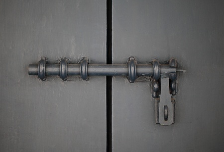 closed wood door with lock の写真素材