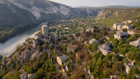 Pocitelj aerial view, tourist village in Bosnia and Herzegovina. Town with mosque, minaret and castleの写真素材