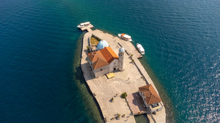 Top view of the island near Perast of the church of our lady of the rocks. Aerial landscape of tourist attraction in the Bay of Kotor, Montenegroの写真素材
