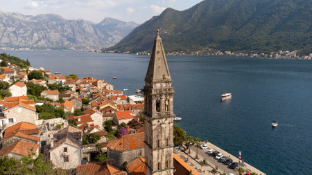 Aerial view of bell tower in Perast city in Kotor Bay, Montenegro. Cityscape of the country tourist attraction in summer travelの写真素材