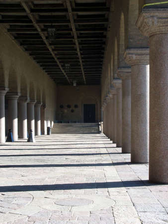 Pillars at an entrance to a giant beautiful buildingの写真素材