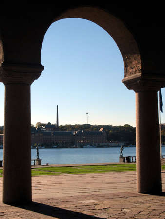 Pillars at an entrance to a giant beautiful buildingの写真素材