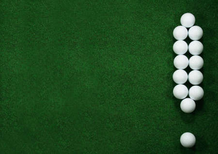 Golfballs as exclamation mark with green message areaの写真素材
