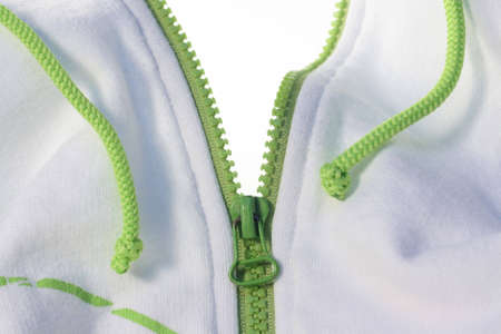 White jacket with green zipper isolated on whiteの写真素材