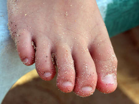 Sandy right foot from childの写真素材