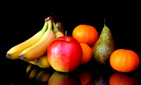 Fruits like banana, apple, orange and pearの写真素材