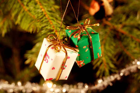 Gift packages in Christmas tree, white and greenの写真素材