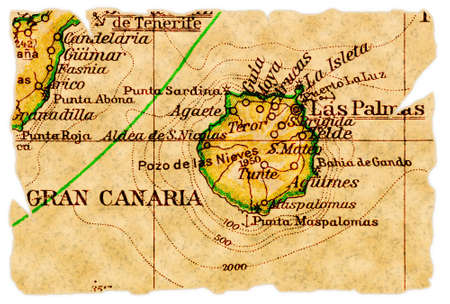Gran Canaria, Canary Islands on an old torn map from 1949, isolated. Part of the old map series.の写真素材