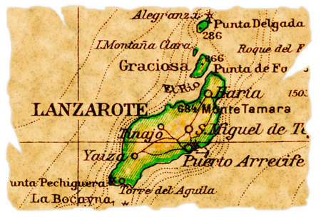 Lanzarote, Canary Islands on an old torn map from 1949, isolated. Part of the old map series.の写真素材
