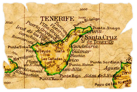 Tenerife, Canary Islands on an old torn map from 1949, isolated. Part of the old map series.の写真素材