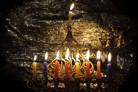 Chanuka candles in chanukiaの写真素材