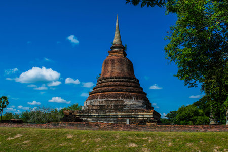 Wat Mahathat Temple in the precinct of Sukhothai Historical Park, a UNESCO World Heritage Site in Thailandの写真素材