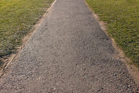 Road between Grass