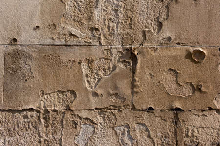 Aged, Damaged Sand Brick Wallの写真素材