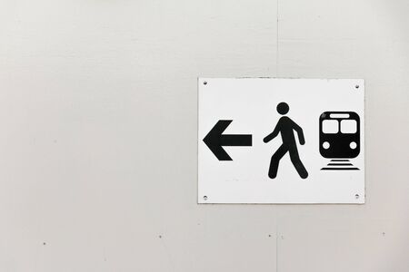 Traffic Sign: Pedestrians Way and Bus with Arrow on White Wood background