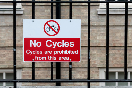 Traffic Sign: No Cycles on Metal Fence -- Cycles are prohibited from this areaの写真素材