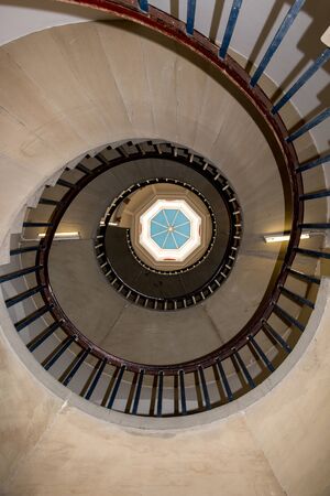 Vintage Aged Spiral Staircase Bottom Viewの写真素材