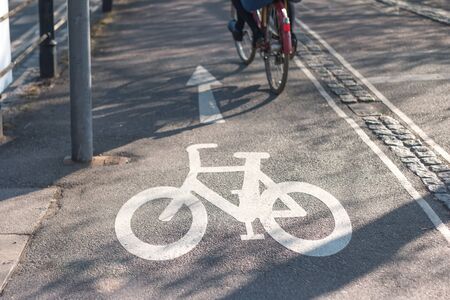 White Bicycle Sign on Street