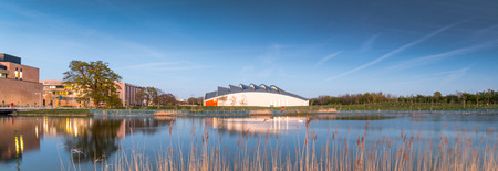 Cambridge, UK - April 21, 2015: Panorama of Cambridge Sports Centre, UK in Twilight. It locates on West Cambridge Campus, so there are plenty of nature scenic and also modern buildings.のeditorial素材