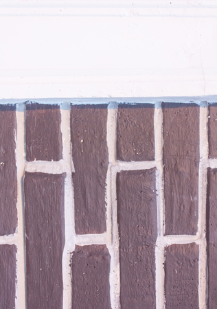 brown brick wall with white gap space between block