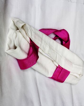 pink and white textile shopping bagの写真素材