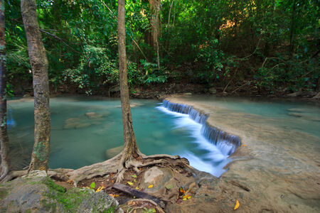 Soft water at waterfall, tree, greenの写真素材