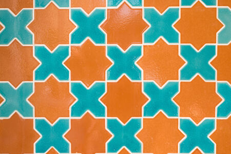 Green and orange color ceramic tile star shape