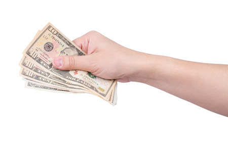 hand with stack of dollars isolated on white.