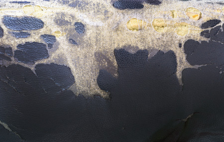 Old bad condition artificial leather seats background.