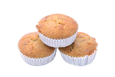 Pile of banana muffin cake, isolated on white backgroundの写真素材
